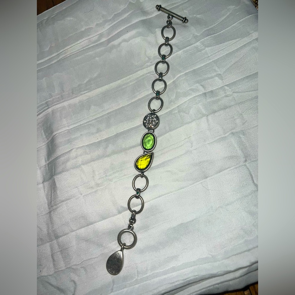 Silver bracelet with stones